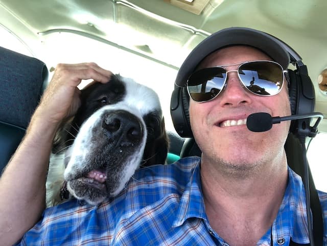 Matt Van Bergen with their aircraft